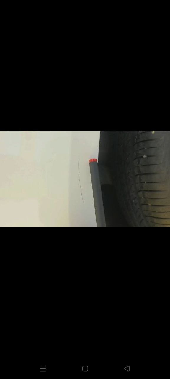 Царапина на кузове Volkswagen Tharu у арки колеса